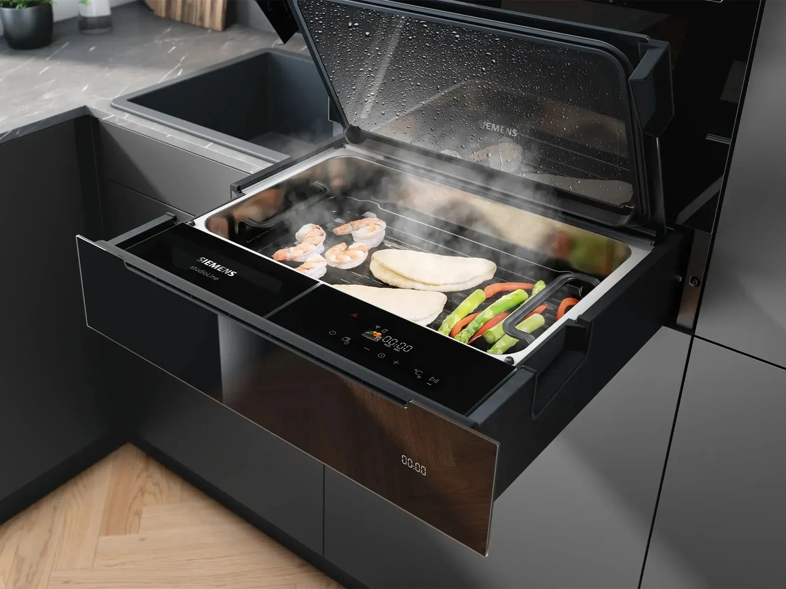 Wärmeschublade unter dem Backofen · © Siemens