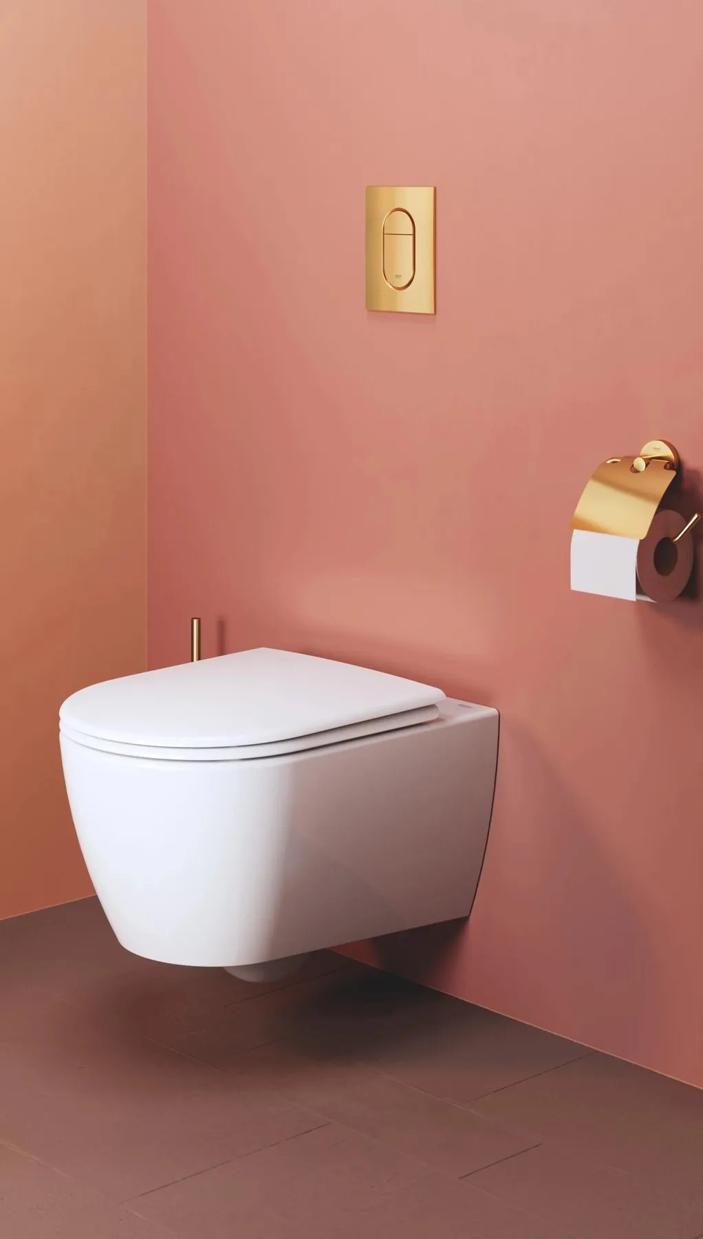 Wall-hung WC and gold flush plate · © GROHE