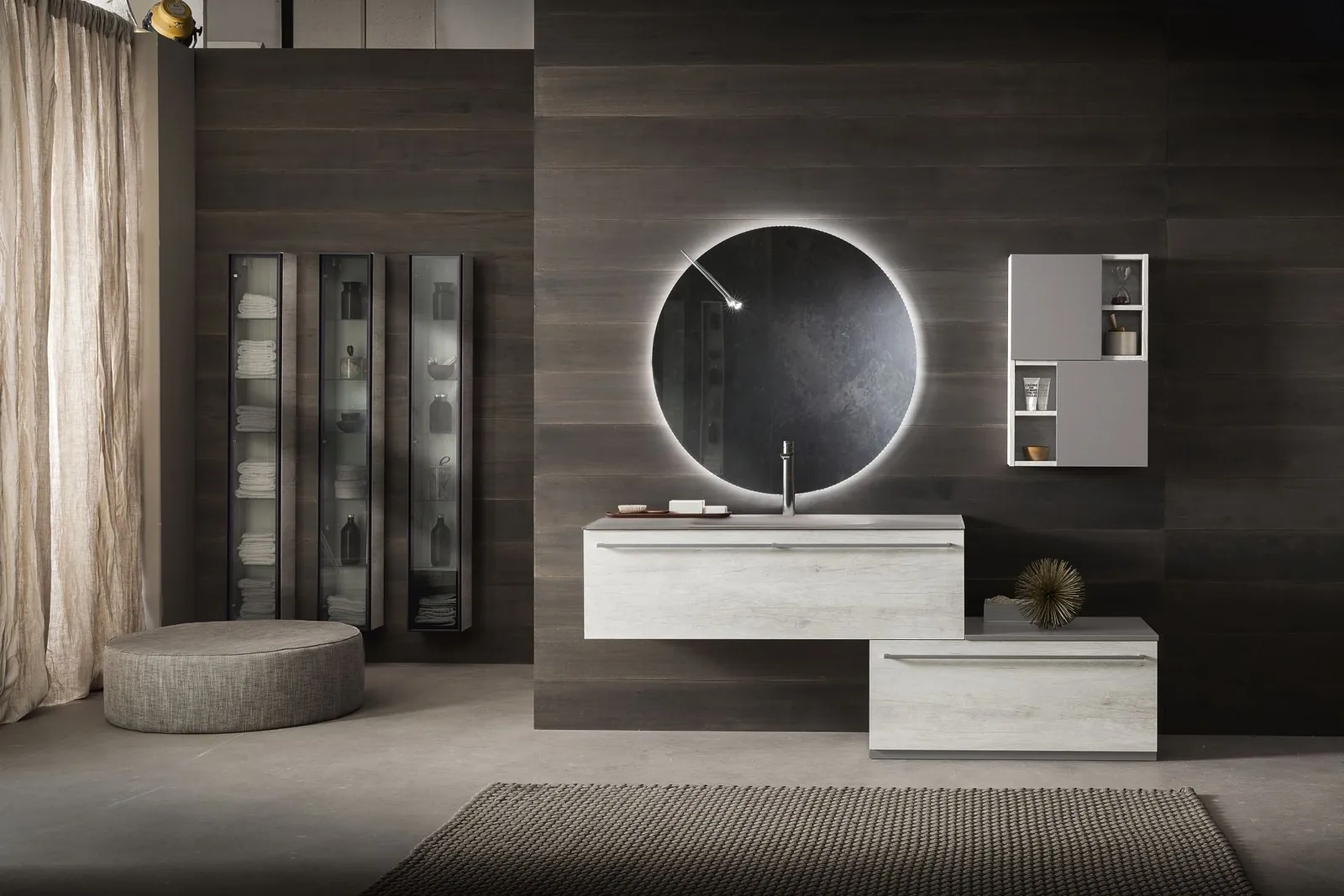 Round backlit mirror, dark mood · © Synergie Bagni