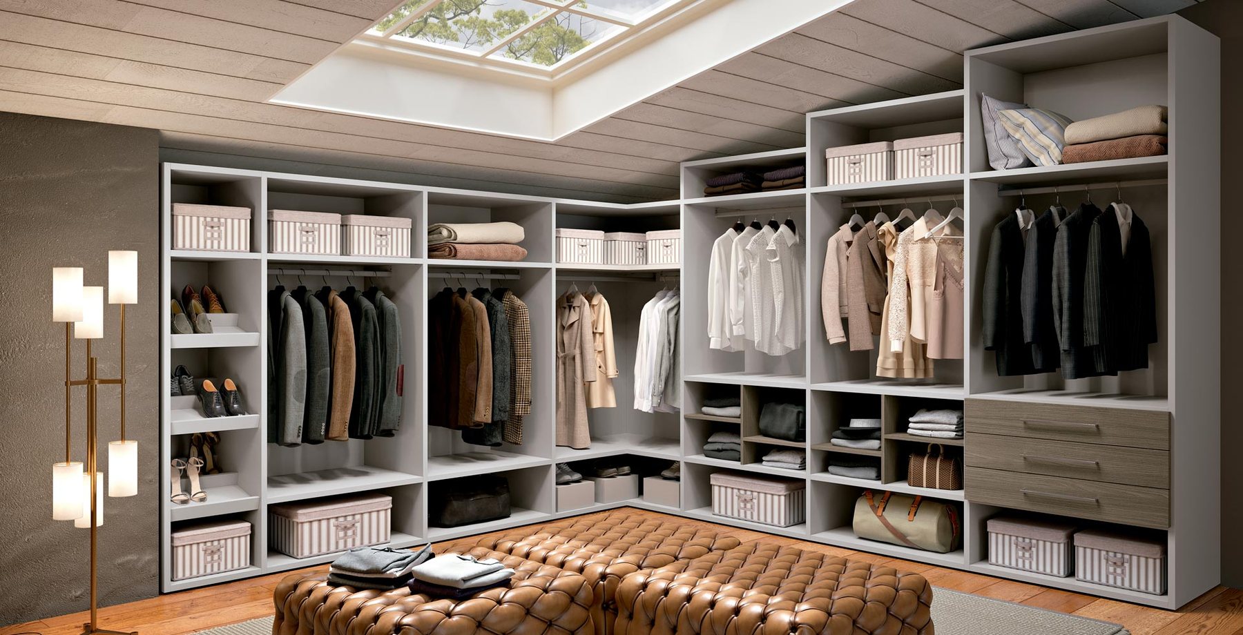 Open walk-in wardrobe and buttoned pouffe · © Ferrimobili