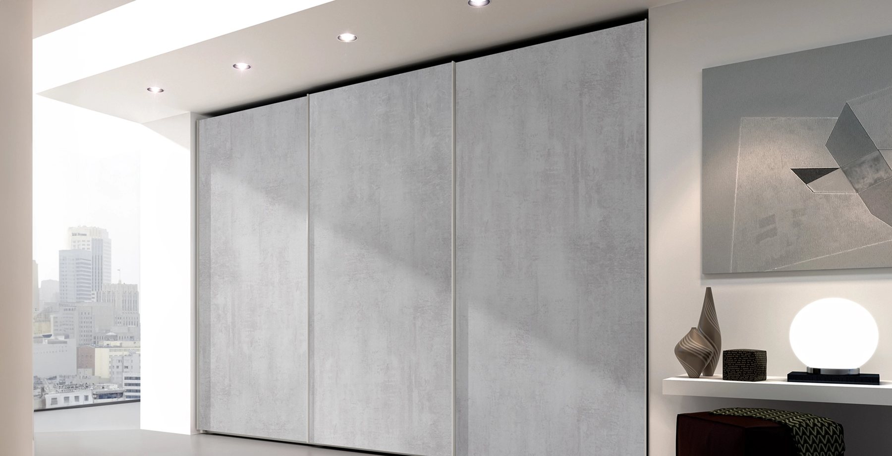 Concrete-effect sliding wardrobe · © Ferrimobili