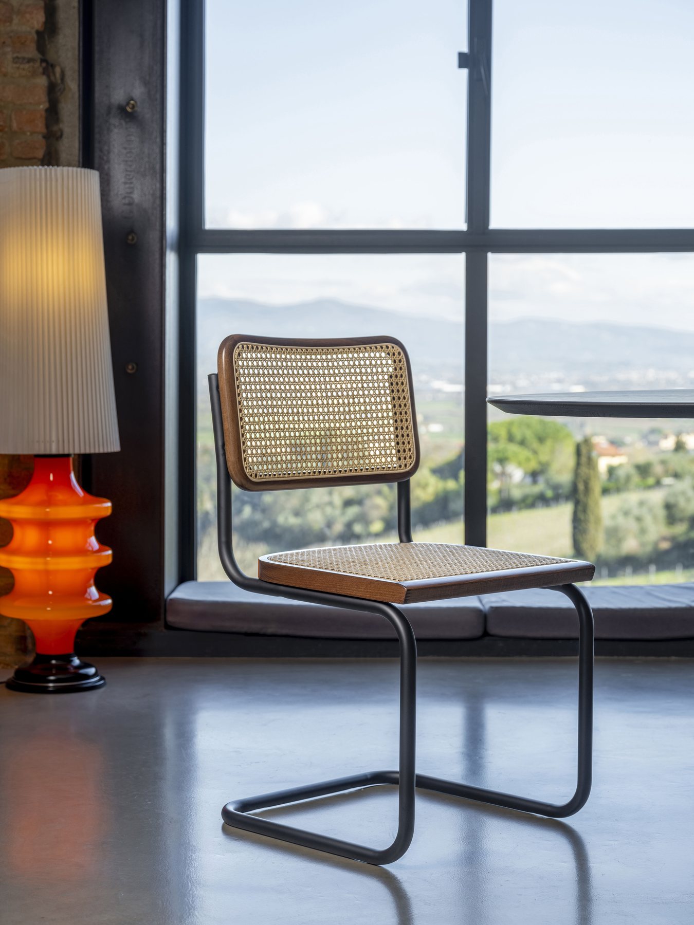 Caned cantilever chair · © CTS Design