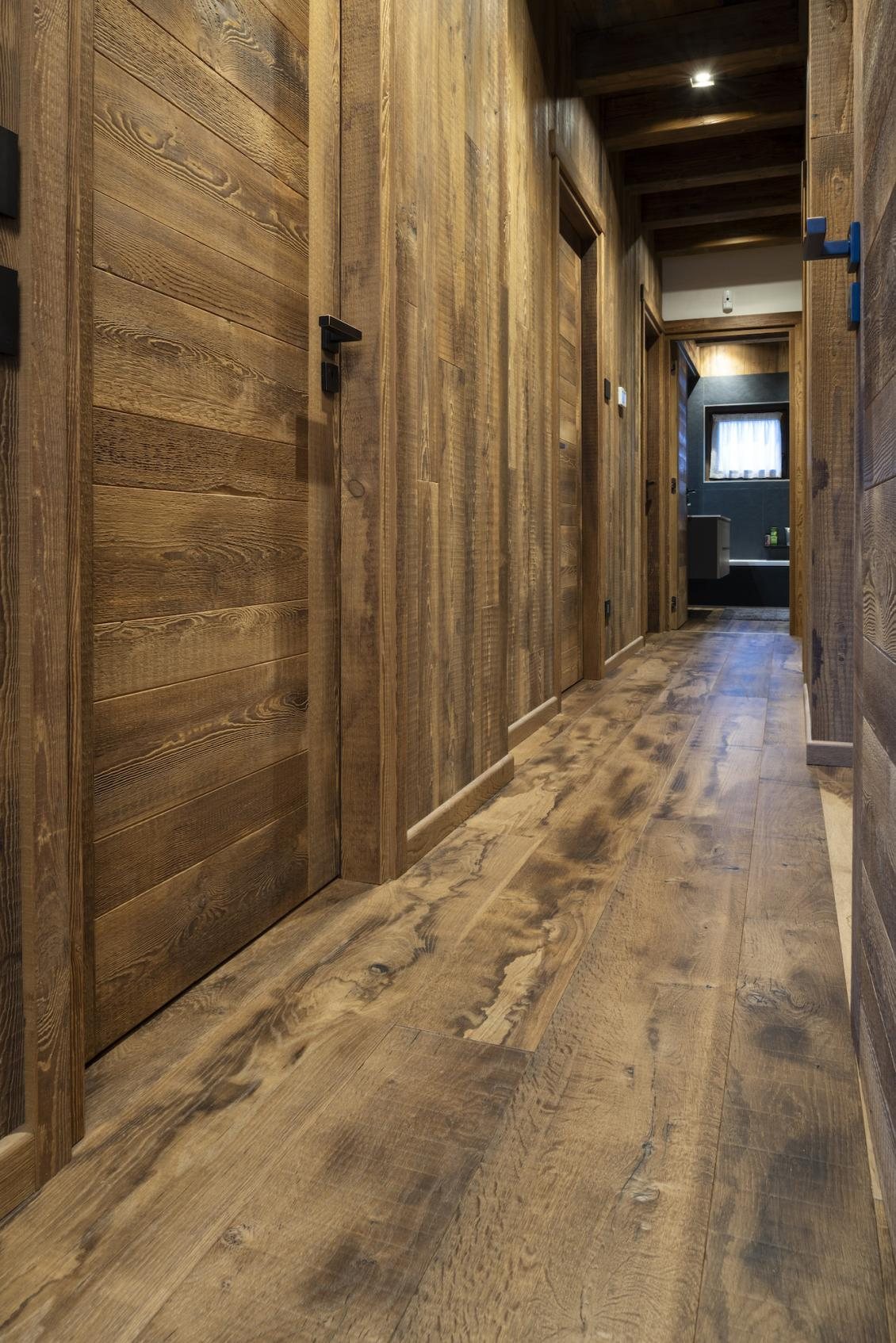 Solid wood panelling and parquet · © F.lli Alberto