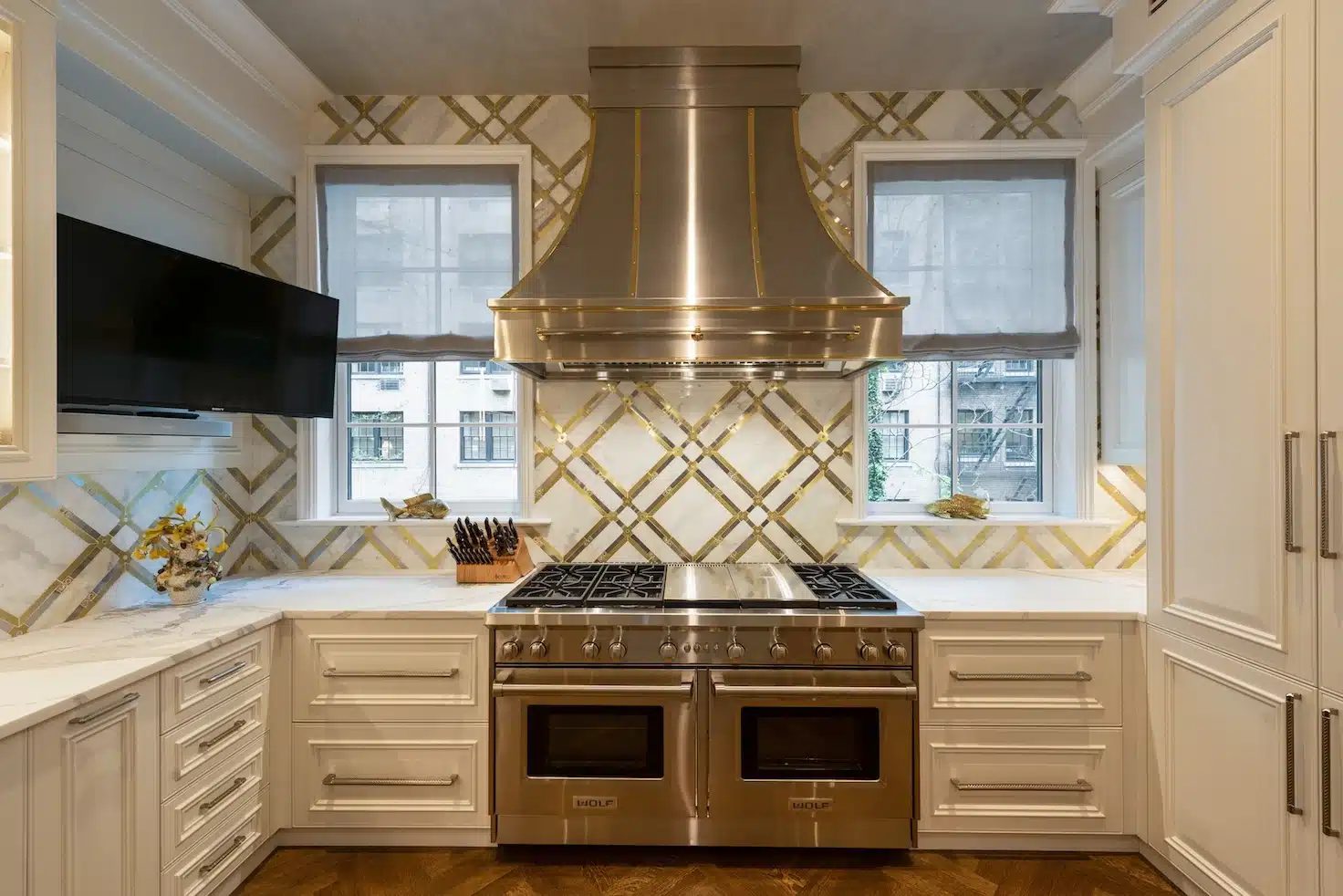 Classic kitchen, brass hood · Project and image © Martini Interiors