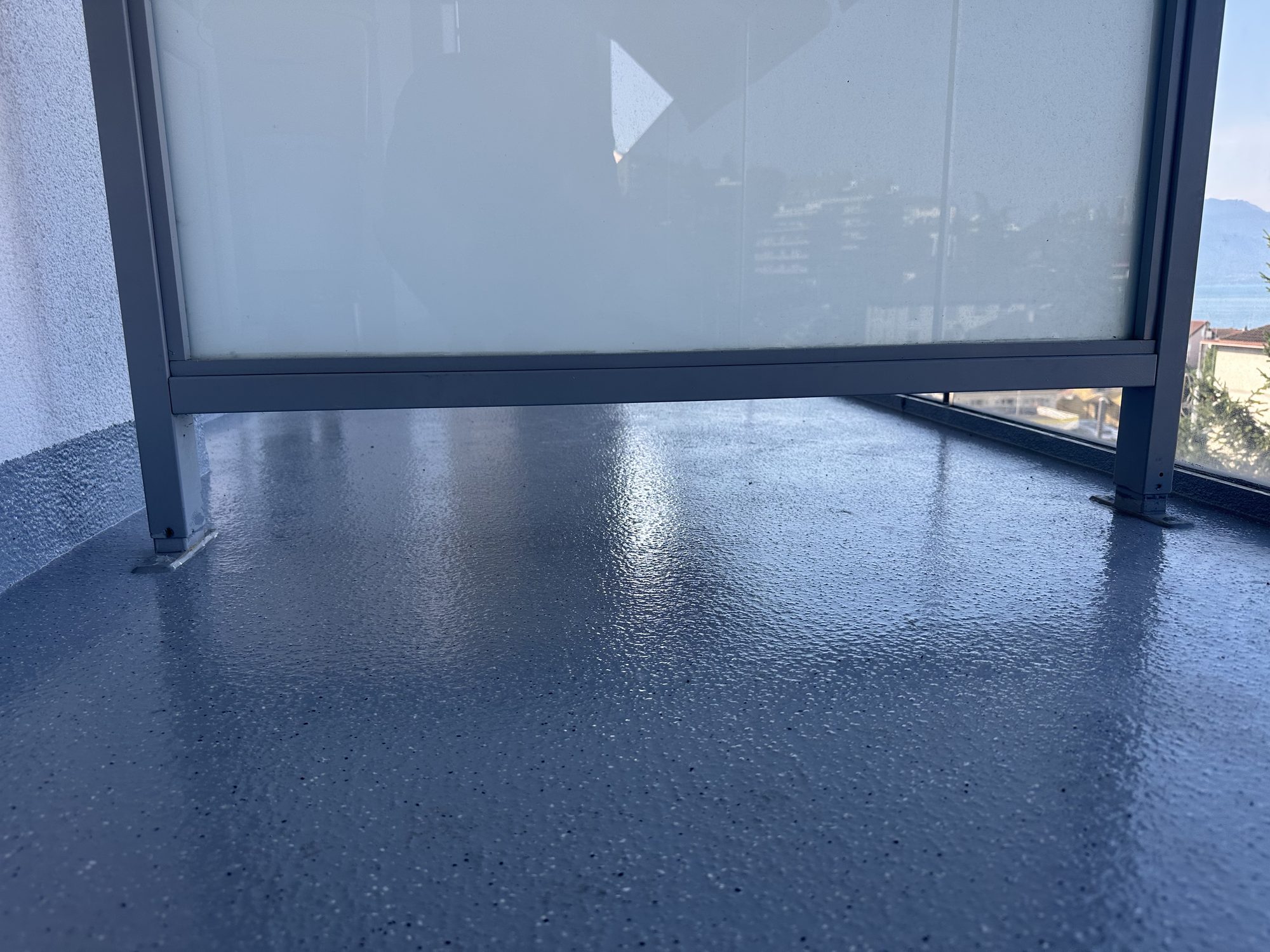 Resin balcony with frosted-glass balustrade