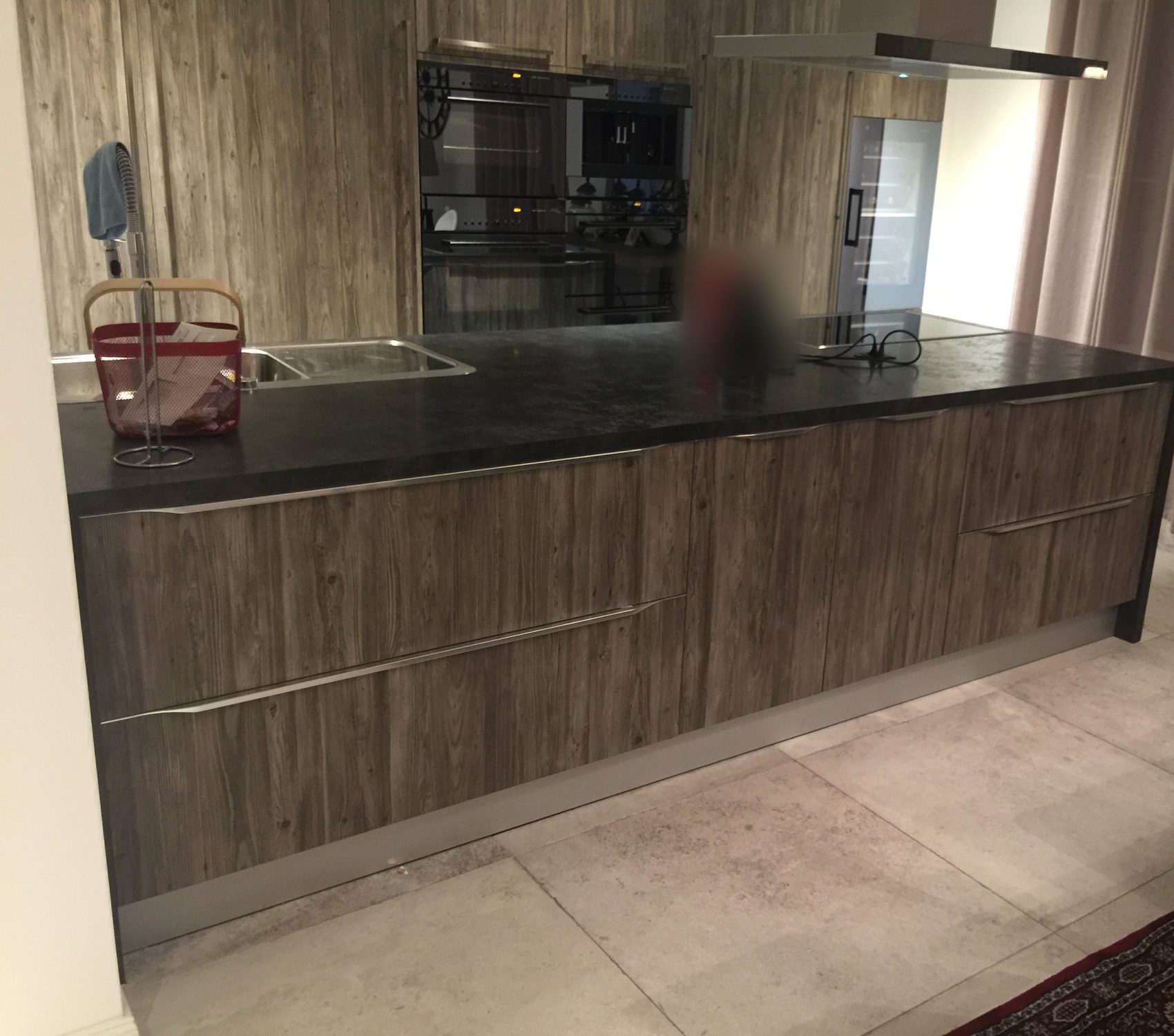 Dark wood fronts and stainless-steel handles