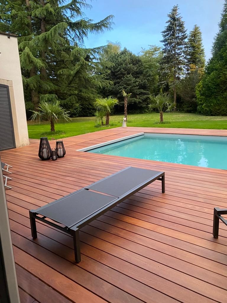 Wooden terrace by the pool