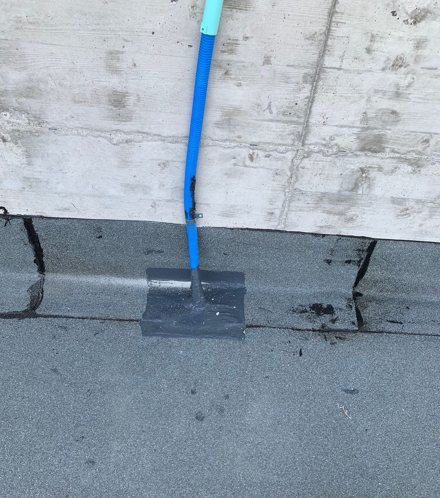 Seal around a pipe at the foot of the wall