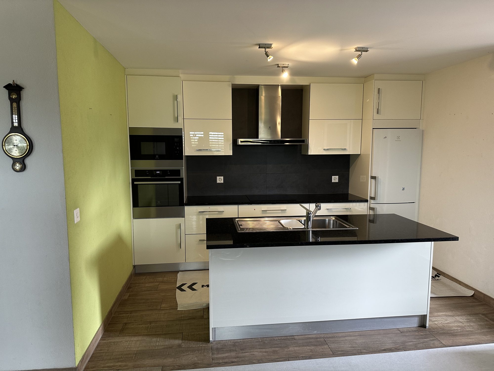 Old white kitchen with island, before the work